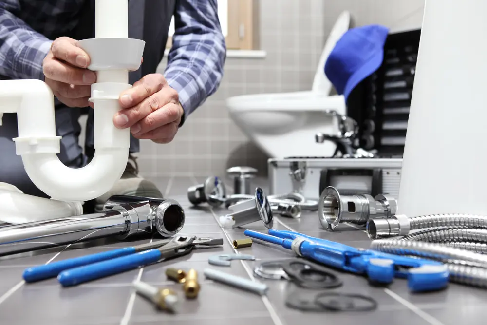 Raul's Plumbing founder working on a plumbing project in Cochise County